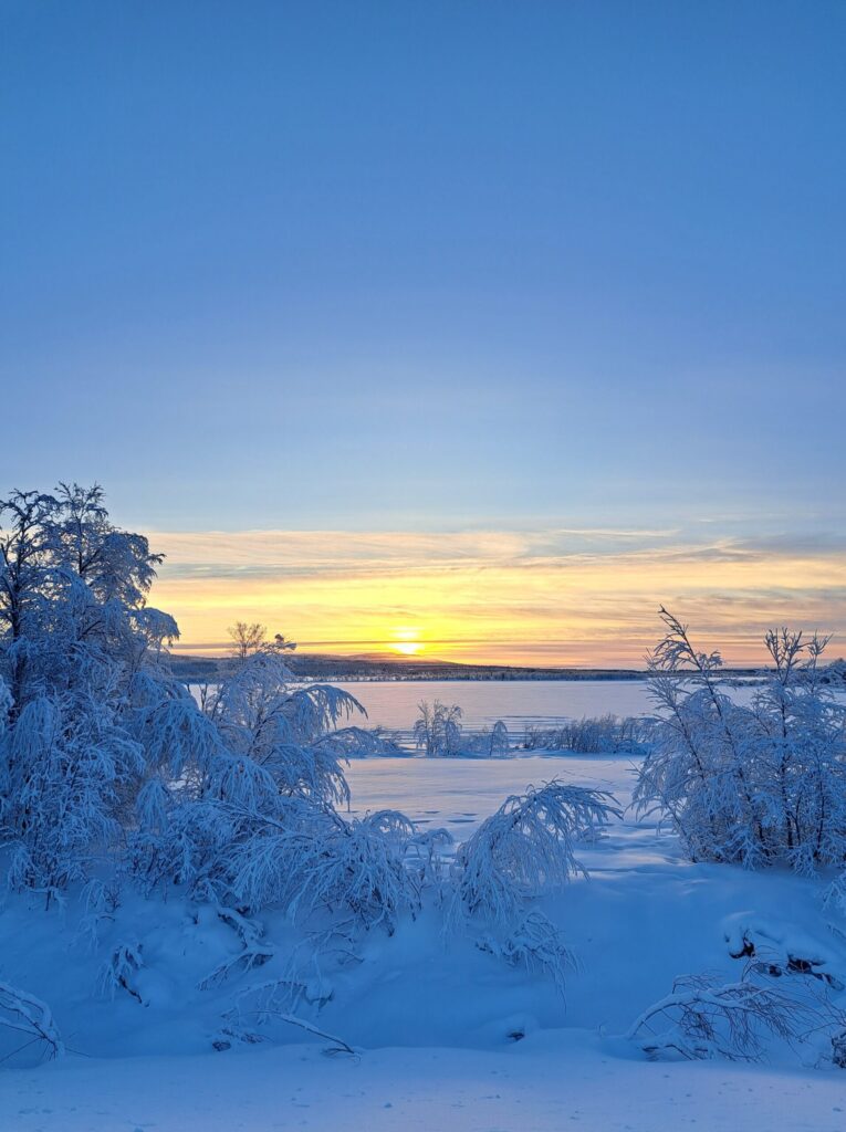 The sun in the horizon after the long polar night, a period without light in Lapland